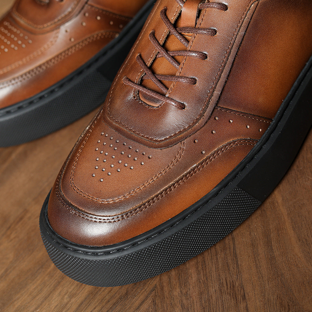 Brown leather low-top sneakers, lace-up front with perforated detailing and rubber sole