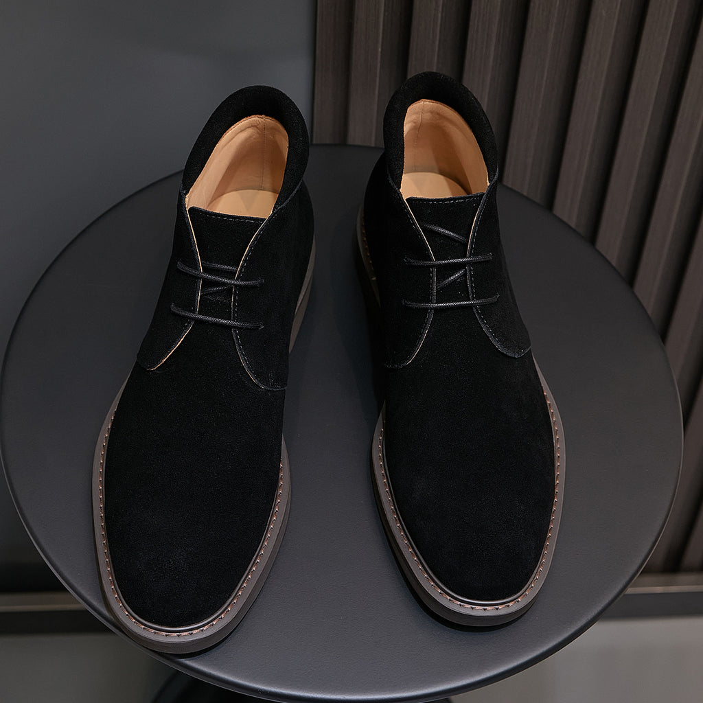 Men's black suede chukka boots with lace-up front and contrast stitching, pair view