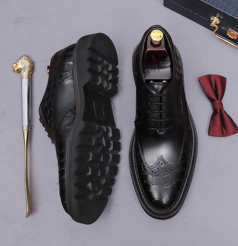 Men's chunky lug sole wingtip brogue oxford shoes, black with tread outsole view