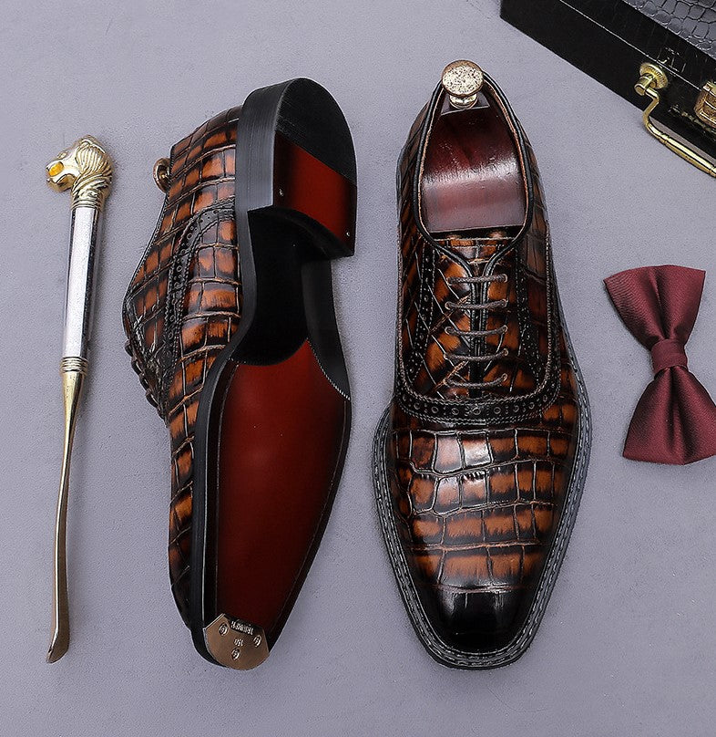 Men's dark brown wingtip brogue oxford shoes, showing side profile and lace-up design