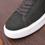 Men's dark suede leather sneakers with lace-up front and white rubber sole