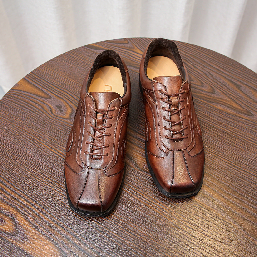 Men's brown leather sneakers with lace-up front and cushioned tongue