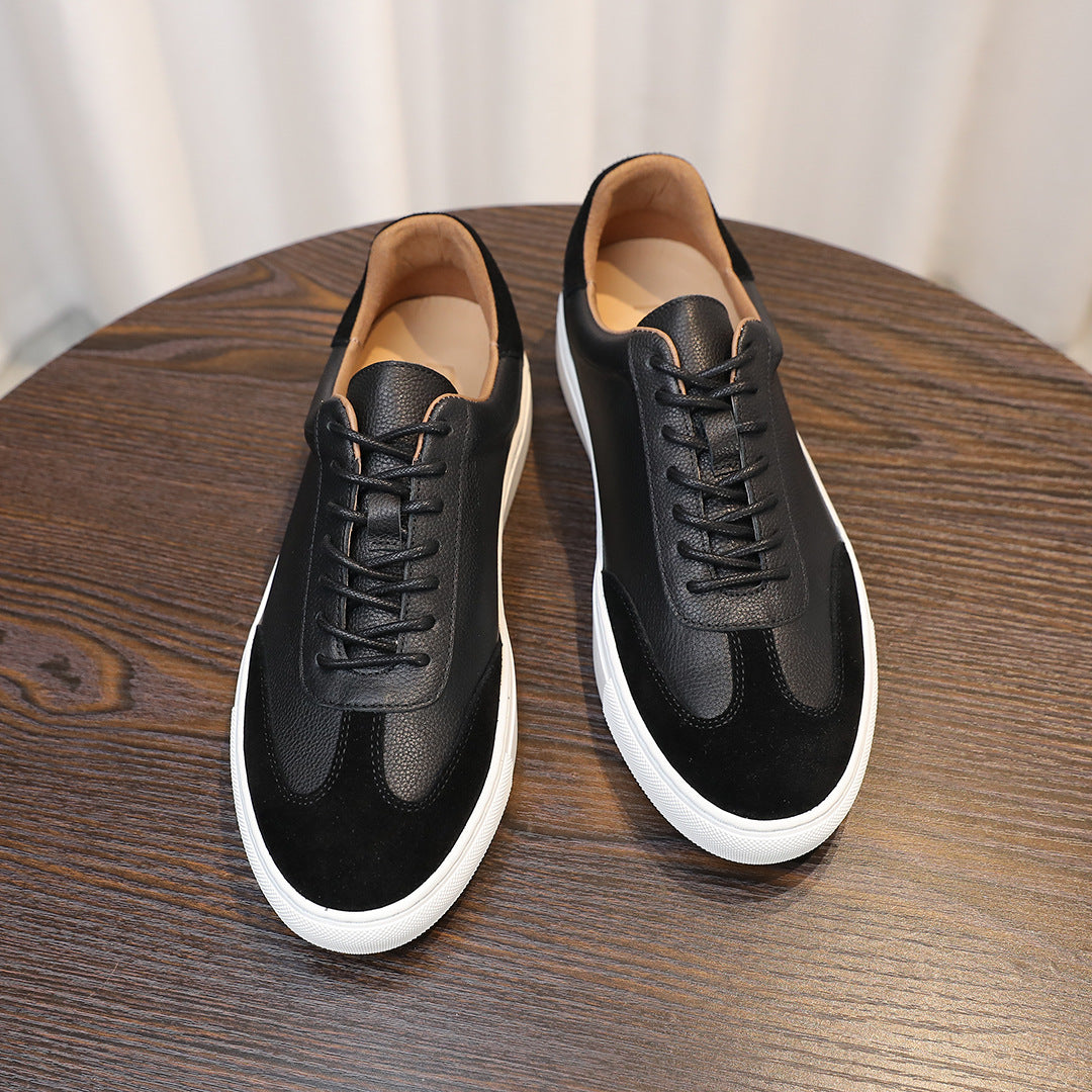 Men's black leather sneakers with lace-up closure, contrast sole and cushioned lining
