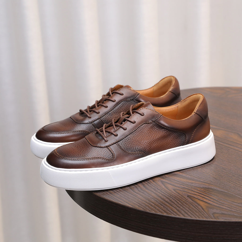 Men's brown leather lace-up sneakers with white sole and cushioned look