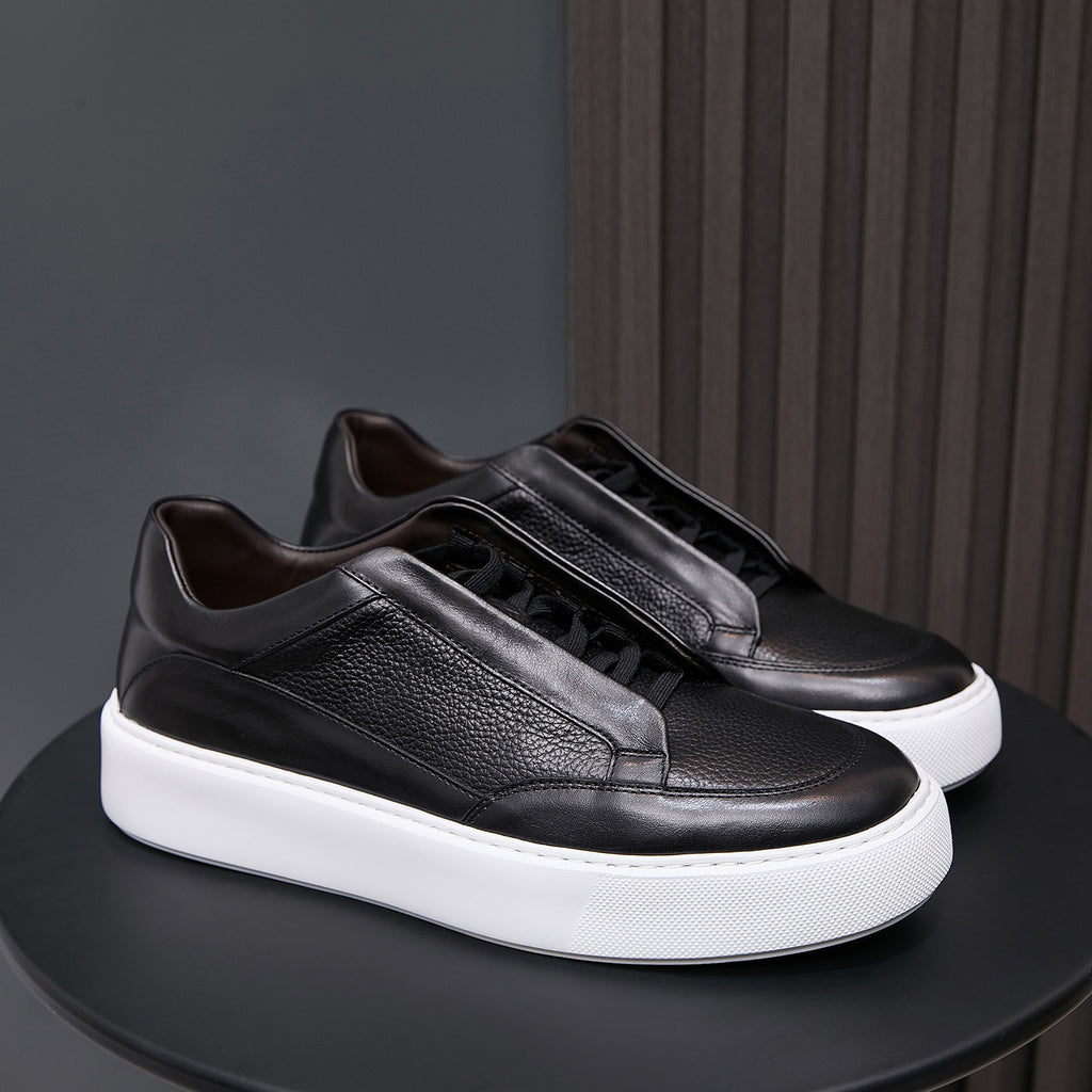 Men's genuine leather sneakers in black with lace-up vamp and white platform sole.