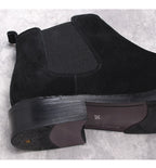 Men's black Chelsea dress boots, textured upper with elastic gore and block heel