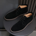 Men's black suede lace-up chukka boots with plain toe and contrast-trimmed sole