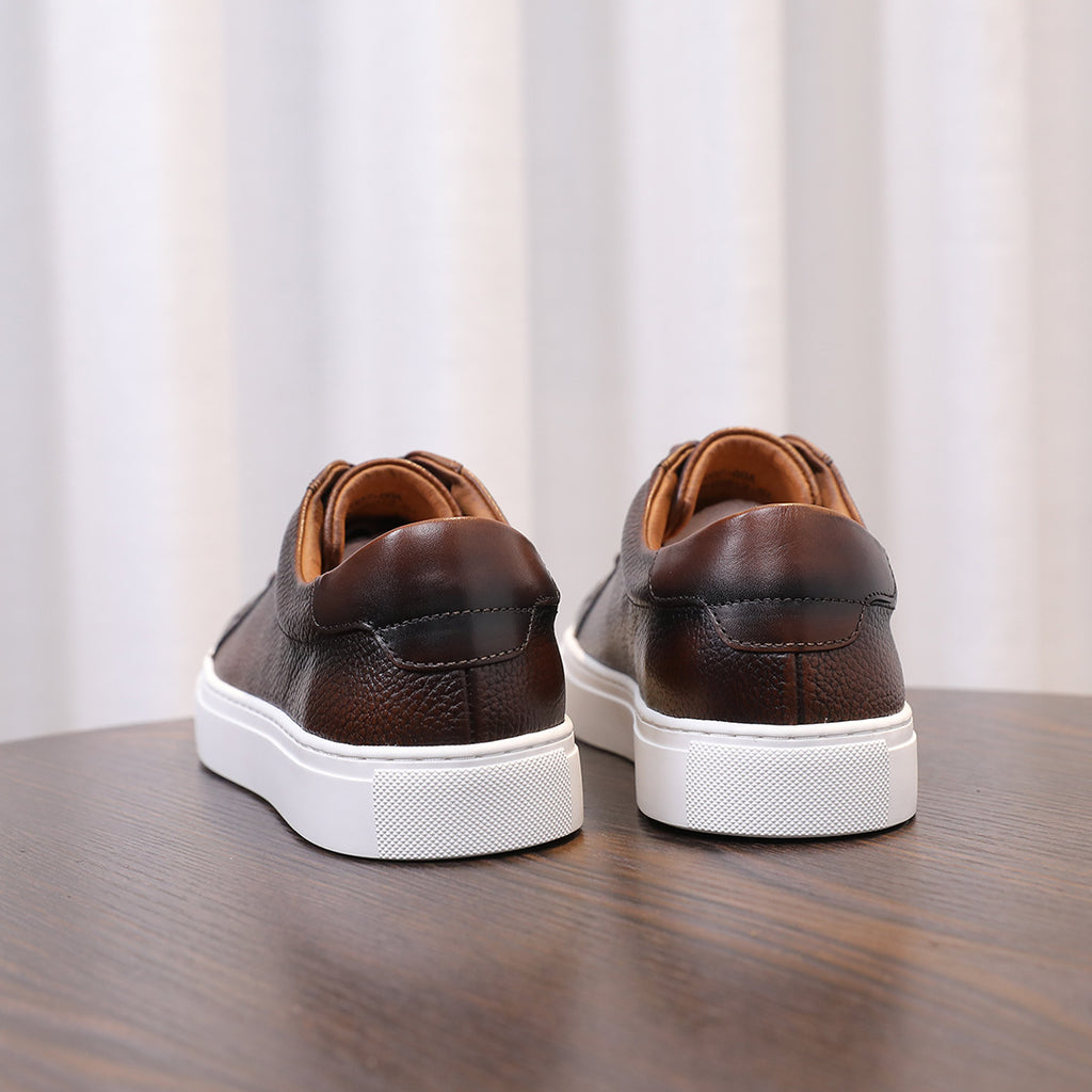 Dark brown genuine leather sneakers, lace-up with white sidewall and padded collar