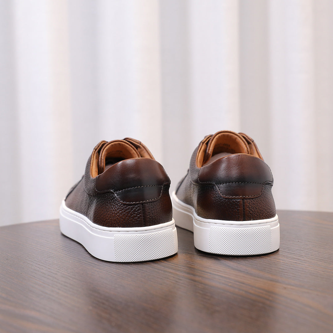 Dark brown genuine leather sneakers, lace-up with white sidewall and padded collar