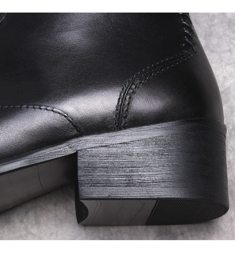 Black leather dress boot heel with stacked thick sole and stitched panel