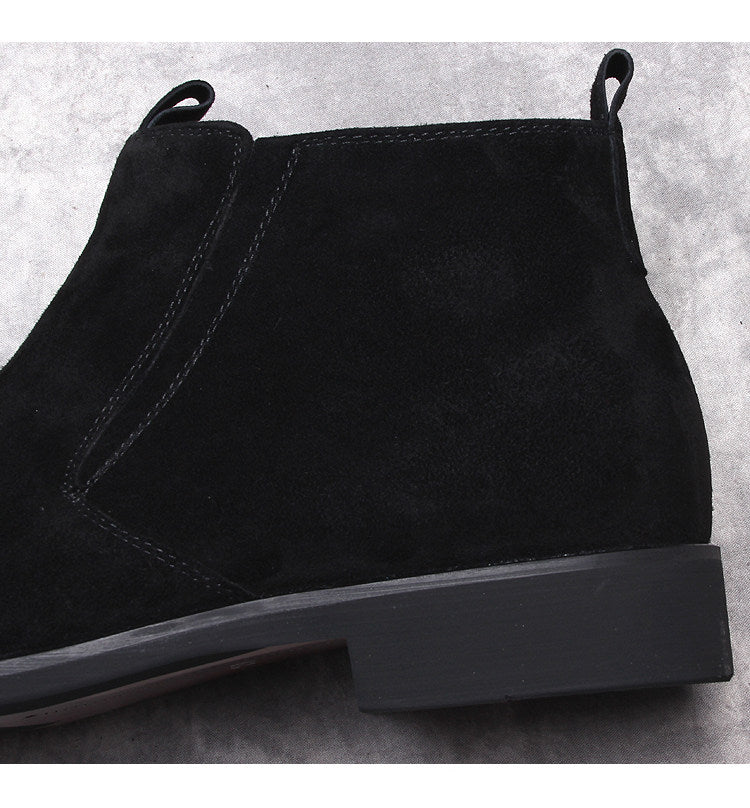 Black suede side-zip ankle boot with thick sole, showing side panel seams.