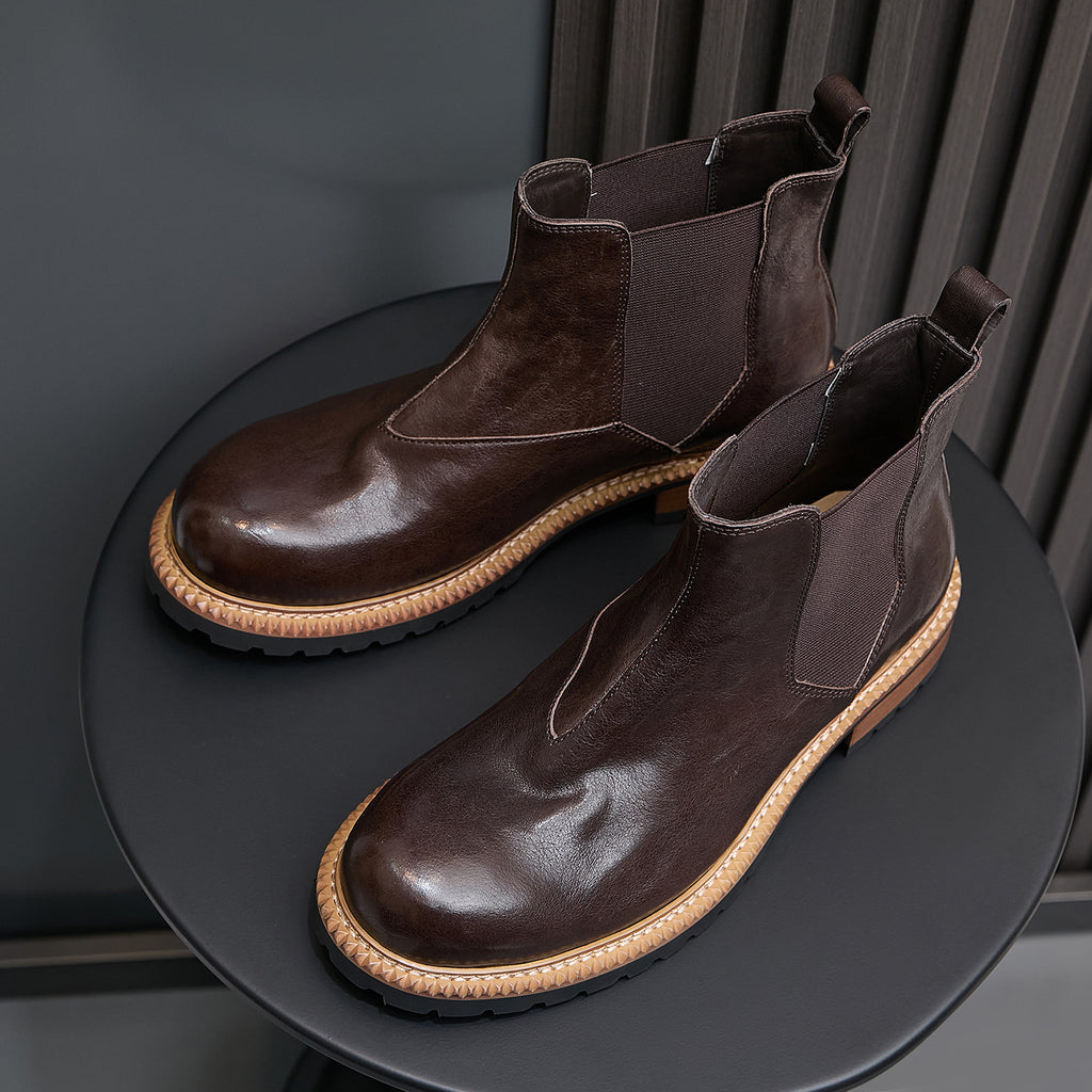 Men's dark brown suede Chelsea dress boots with elastic gore panels and tan welt sole