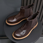 Men's dark brown suede Chelsea dress boots with elastic gore panels and tan welt sole