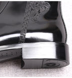 Men's thick-sole leather side-zip boots, black, close-up of thick heel sole