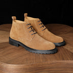 Men's chukka boots tan suede, side view pair with lace-up eyelets and flat sole