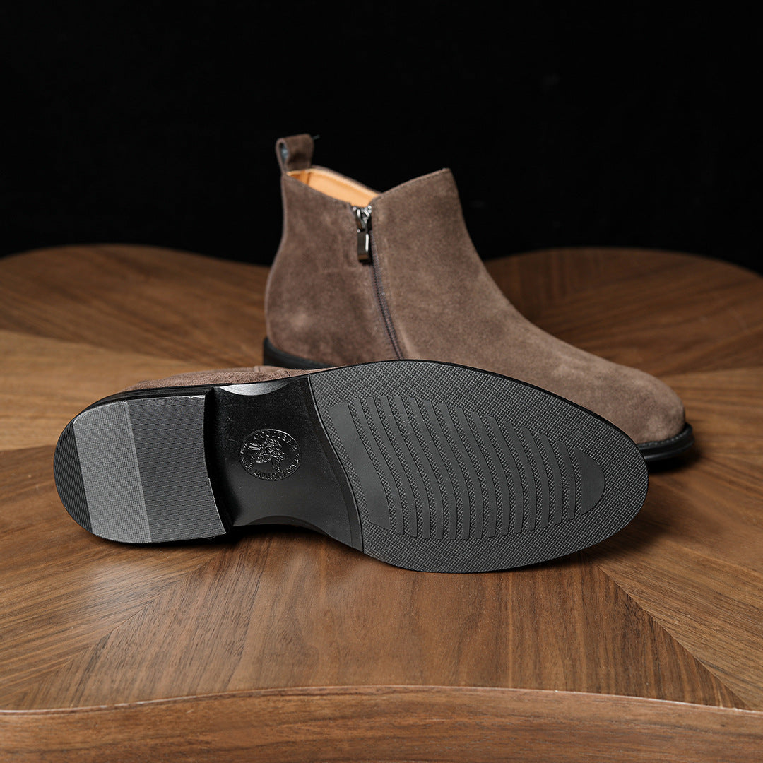 Men's dark brown suede boots with textured outsole and side zipper
