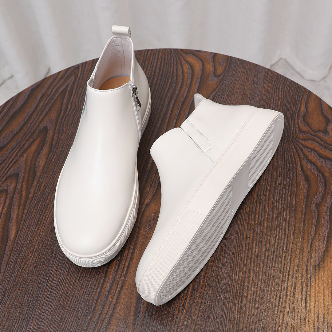 White leather ankle boots with side zipper and thick white rubber outsole