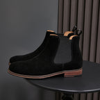 Pointed-toe suede Chelsea dress boots, black, with side elastic panels and stitched sole edge