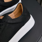 Men's genuine leather sneakers, black, padded collar and tan-lined interior