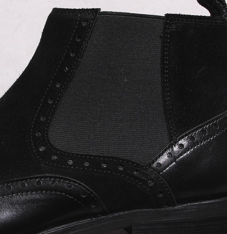 Men's black leather Chelsea boot with elastic side panel and stitched upper seam detail