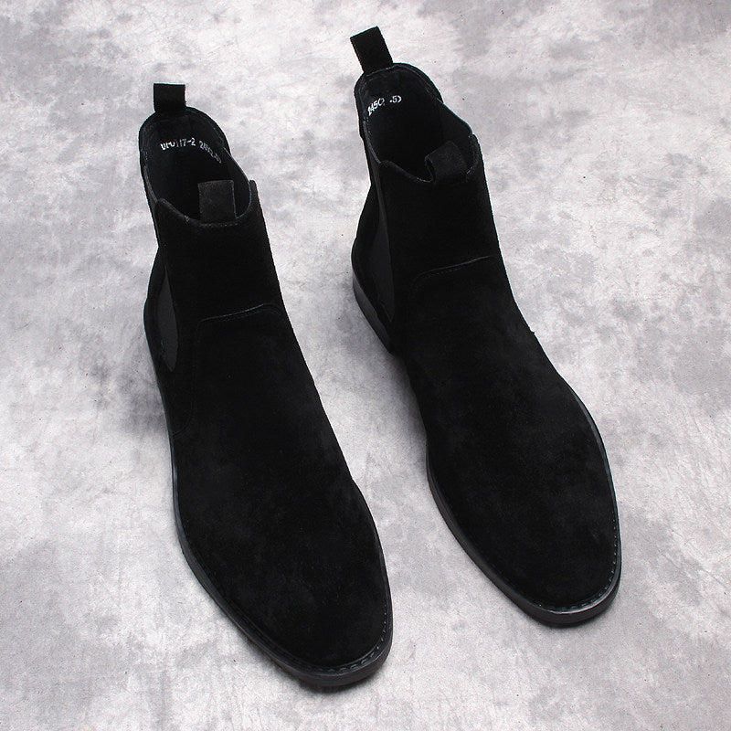 Black suede Chelsea dress boots, pair view with pull tabs and low heels