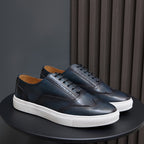 Men's leather lace-up sneakers in dark blue with white rubber sole
