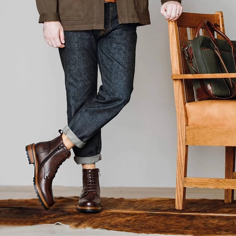 Brown leather lace-up side-zip dress boots worn with blue jeans
