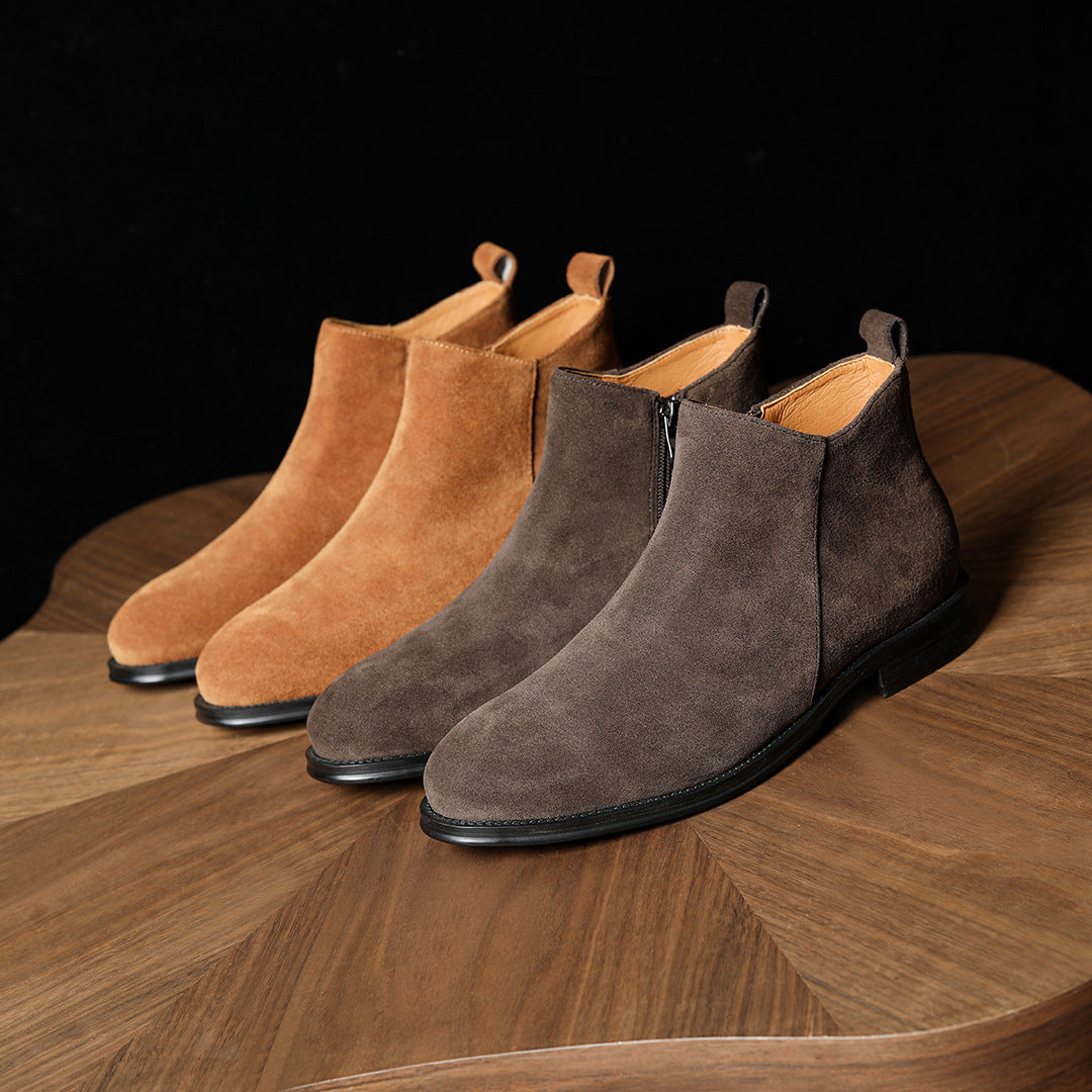 Pair of suede ankle boots with pointed toe and side zippers; tan and dark brown styles.