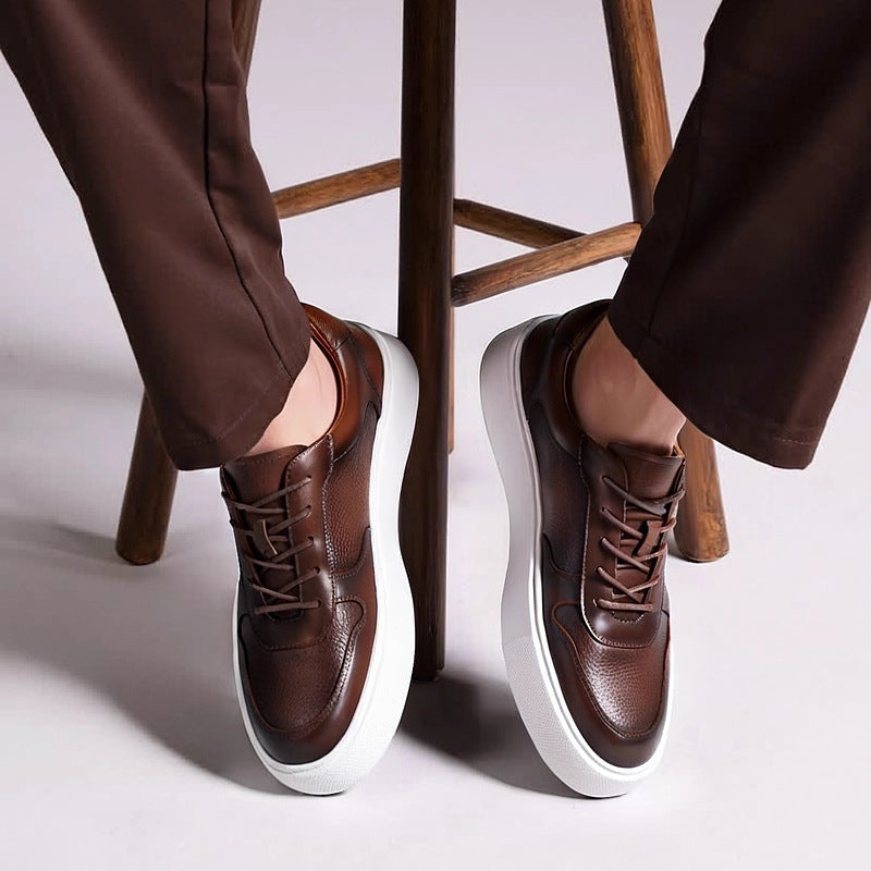 Men's leather sneakers, brown, lace-up with white rubber sole.