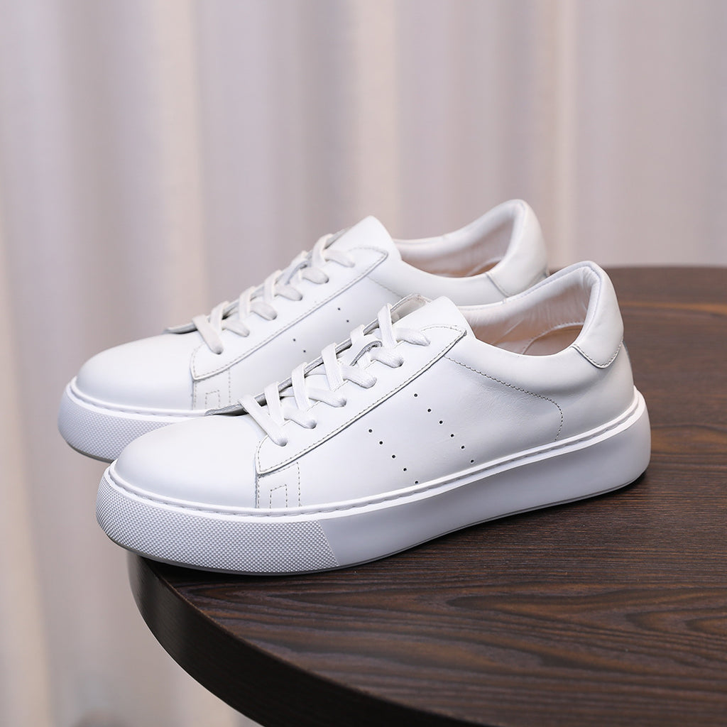 Men's leather sneakers, white, lace-up design with perforated toe and low profile sole