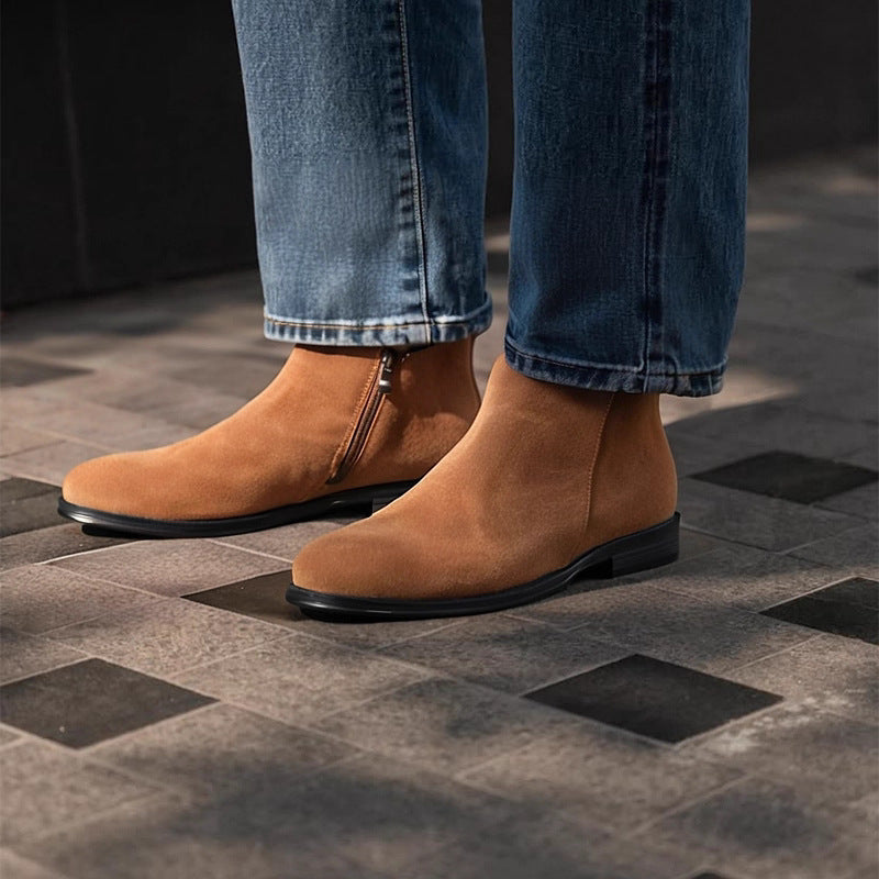 Men's point-toe leather side-zip dress boots in tan suede, worn with jeans