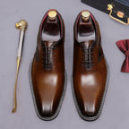Brown wingtip brogue oxford shoes with chunky lug sole and lace-up pair