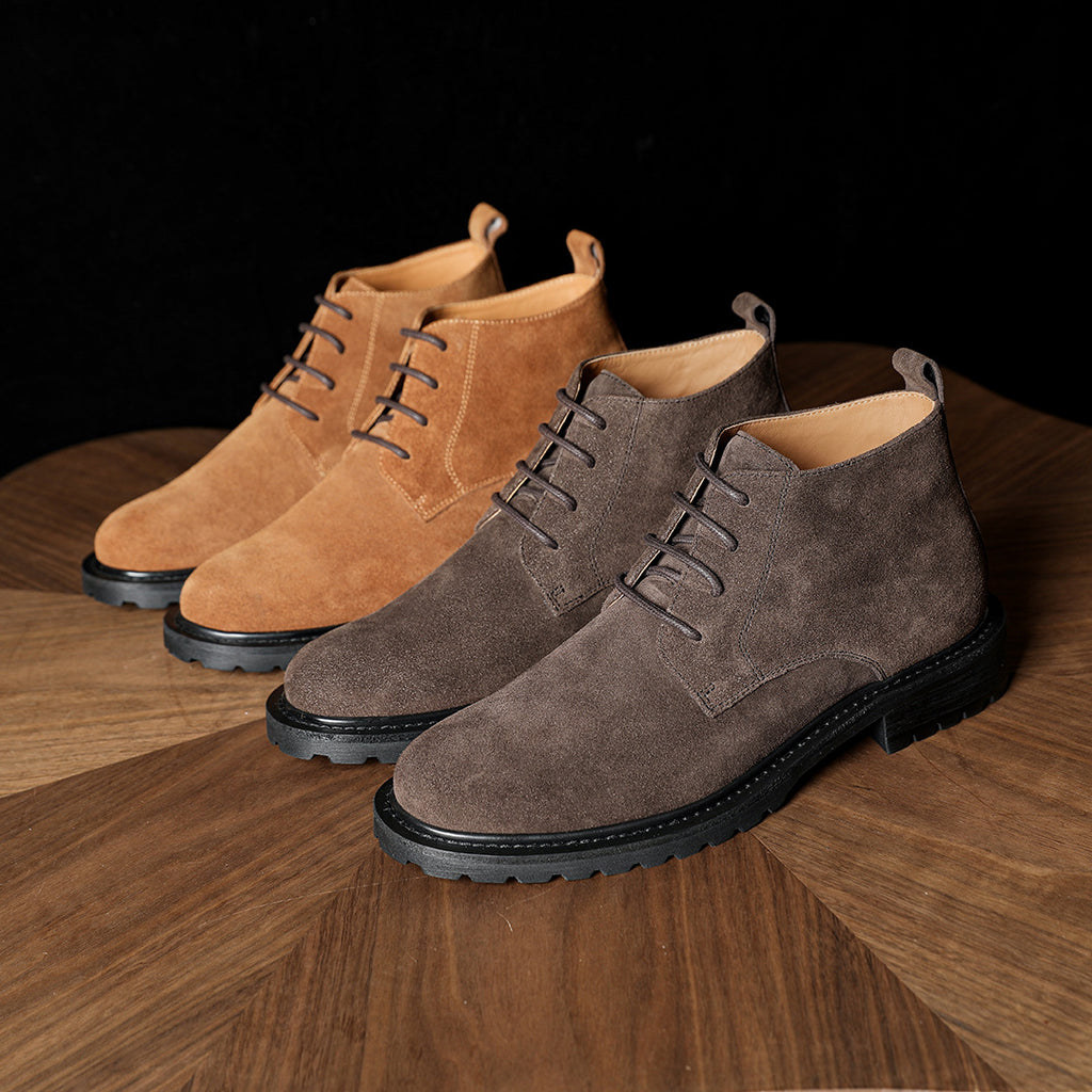 Men's chukka boots set: tan and dark gray suede, lace-up, plain toe, tread rubber sole.