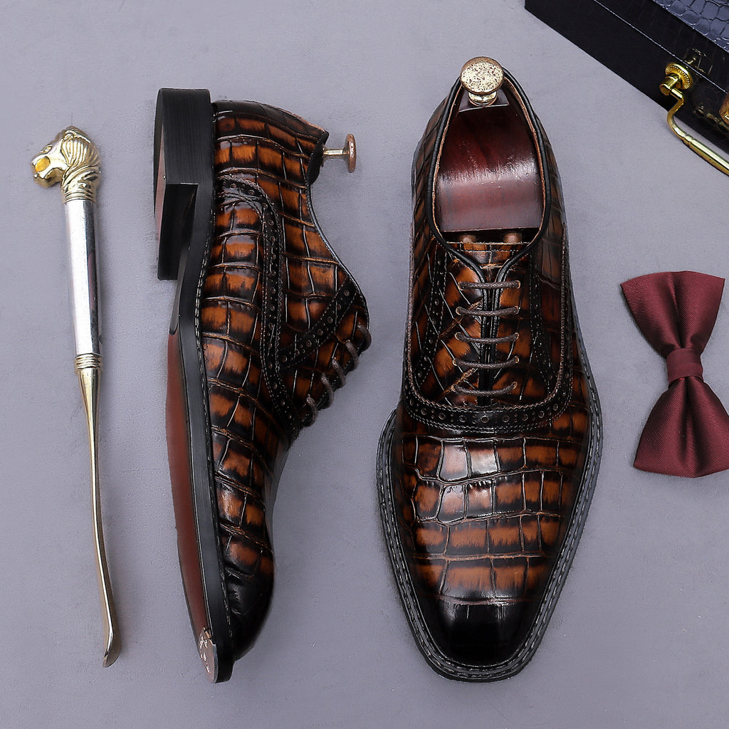 Men's dark brown wingtip brogue oxford shoes with chunky lug sole, side and front view