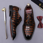 Men's dark brown wingtip brogue oxford shoes with chunky lug sole, side and front view