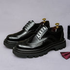 Men's leather derby shoes, glossy black and silver panels with pointed toe and lace-up.