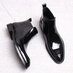 Men's thick-sole leather side-zip boots, black, pair view showing sides