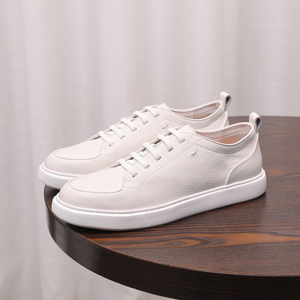 Men's genuine leather sneakers, white low-top with lace-up front and thick rubber sole
