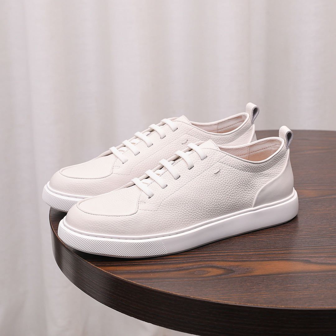 Men's genuine leather sneakers, white low-top with lace-up front and thick rubber sole