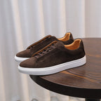 Men's suede leather lace-up sneakers with white rubber sole, brown with tan lining