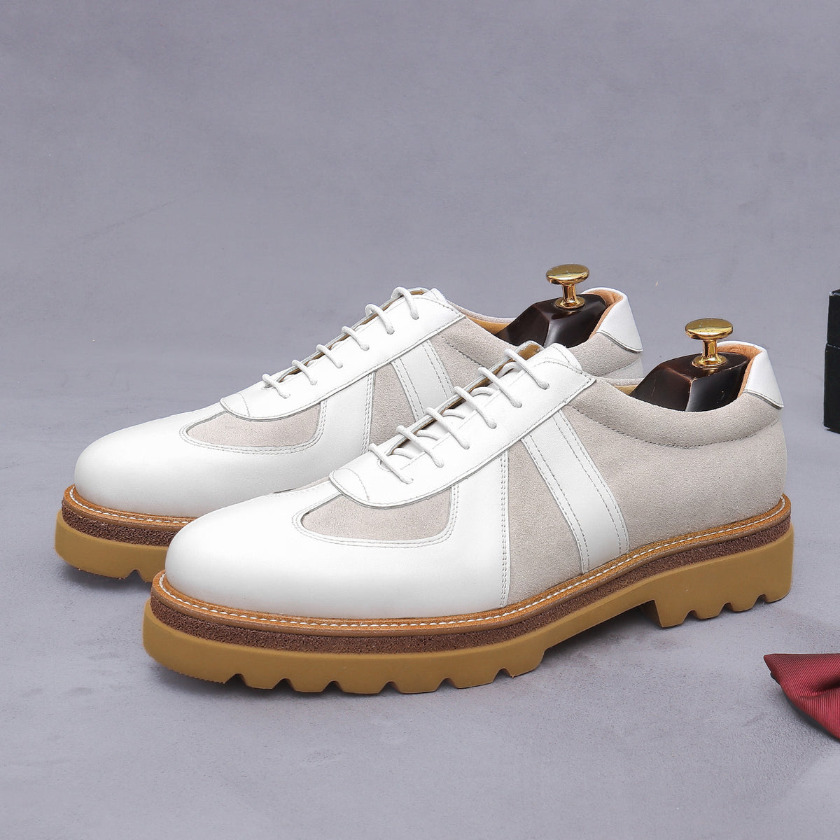 Men's white and gray suede paneled lace-up sneakers with chunky tan gum sole