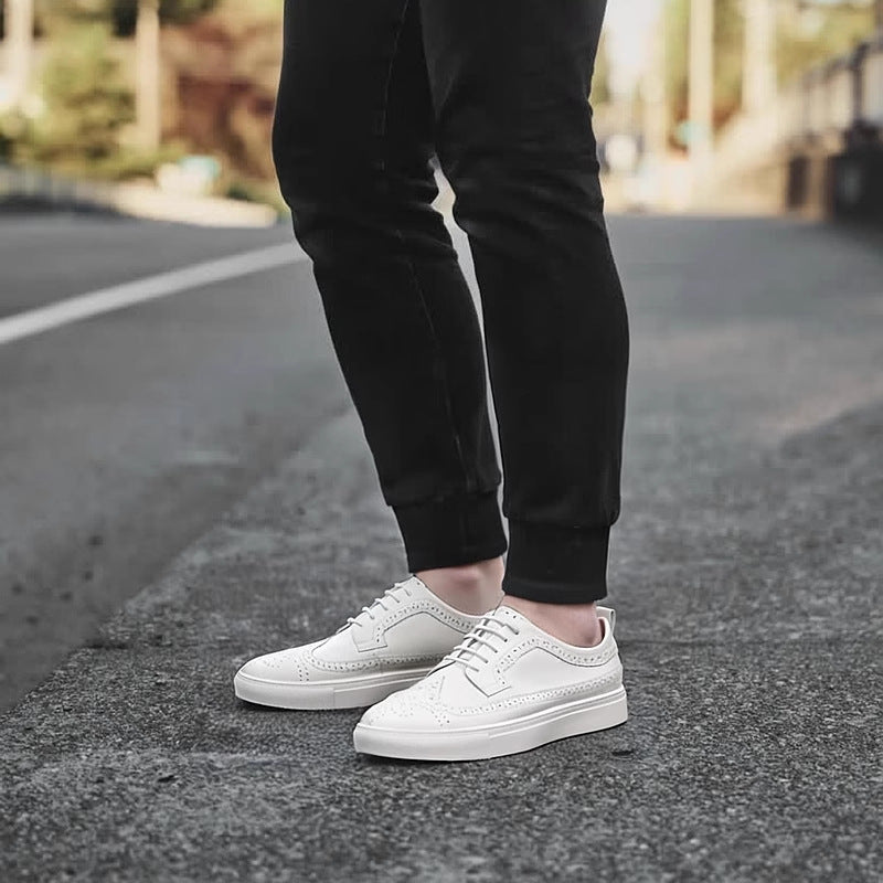 Men's genuine leather sneakers, white lace-up with perforated toe and side panel detail.