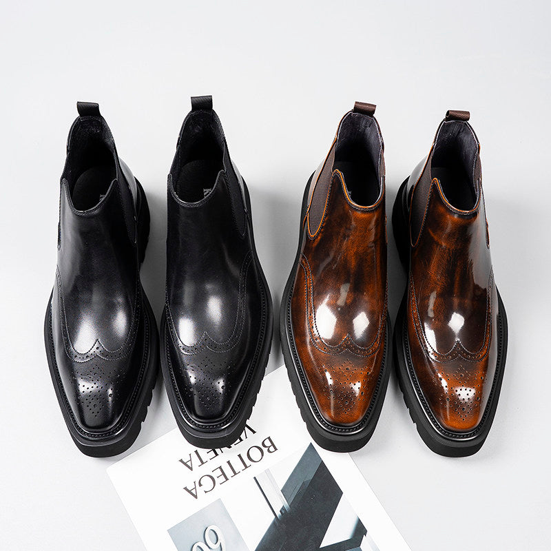 Pair of leather Chelsea dress boots: black and dark brown, with elastic goring and brogue detail