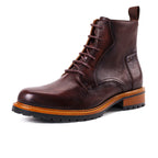 Dark brown pointed-toe leather ankle boots with lace-up front and side-zip closure.