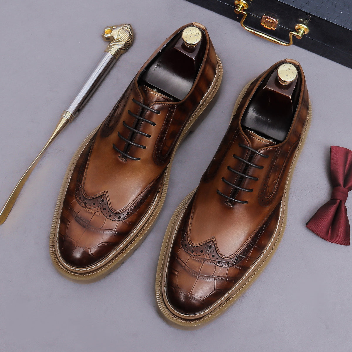 Men's chunky lug sole wingtip brogue oxford shoes, brown leather-style lace-up pair