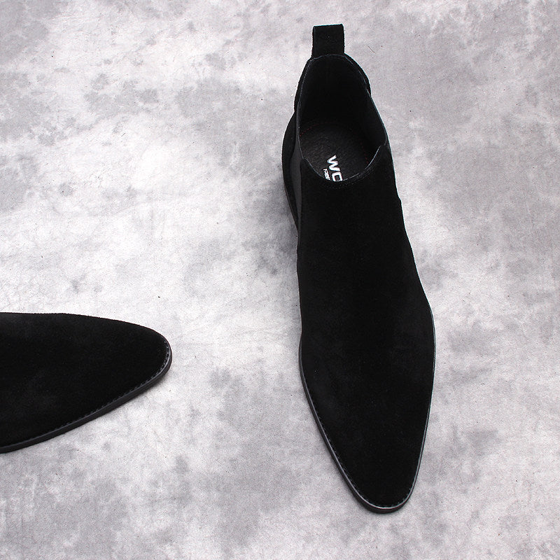 Black Chelsea dress boot with pull tab and smooth upper, shown from side