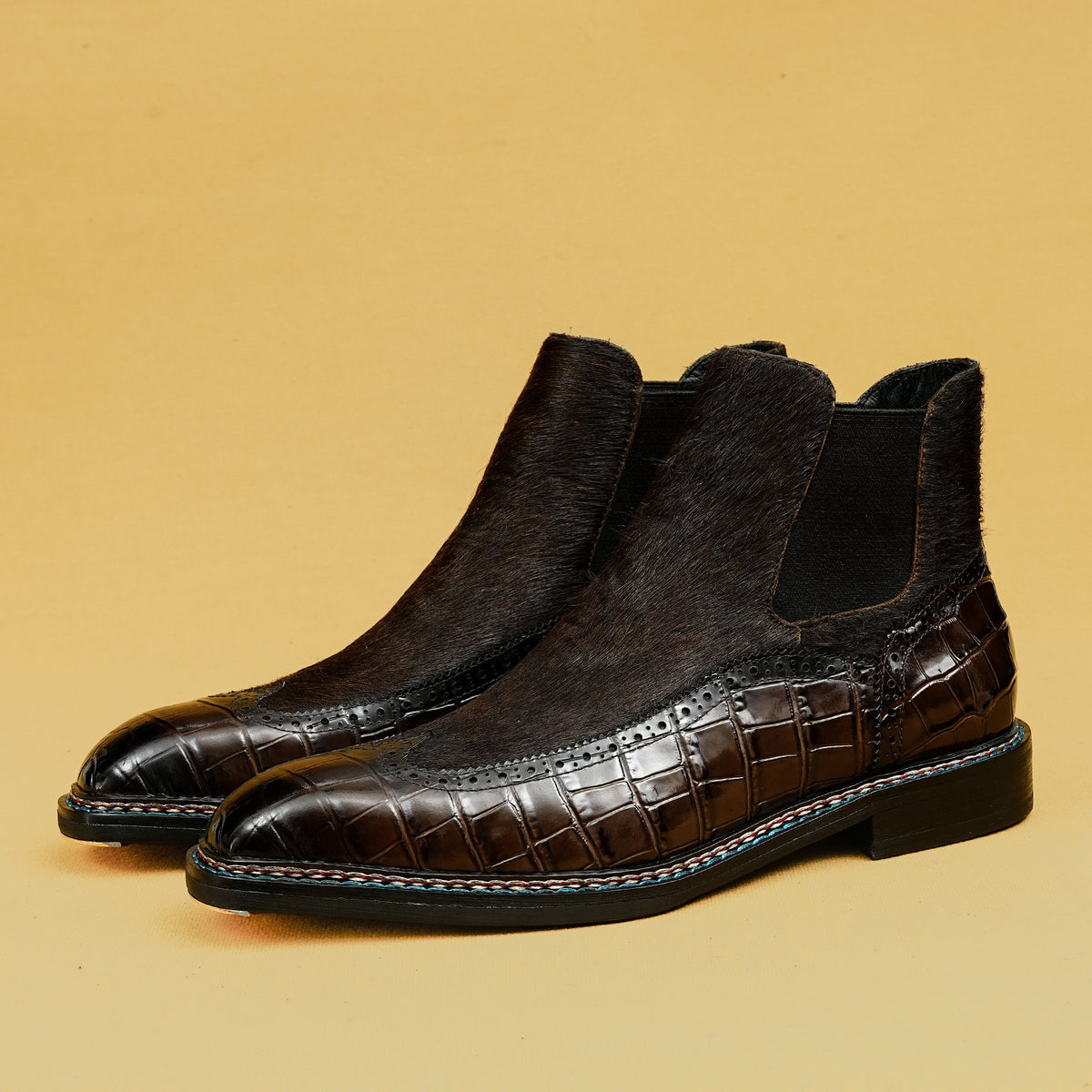 Dark brown leather chelsea dress boots, slip-on with elastic side panels and brogue toe