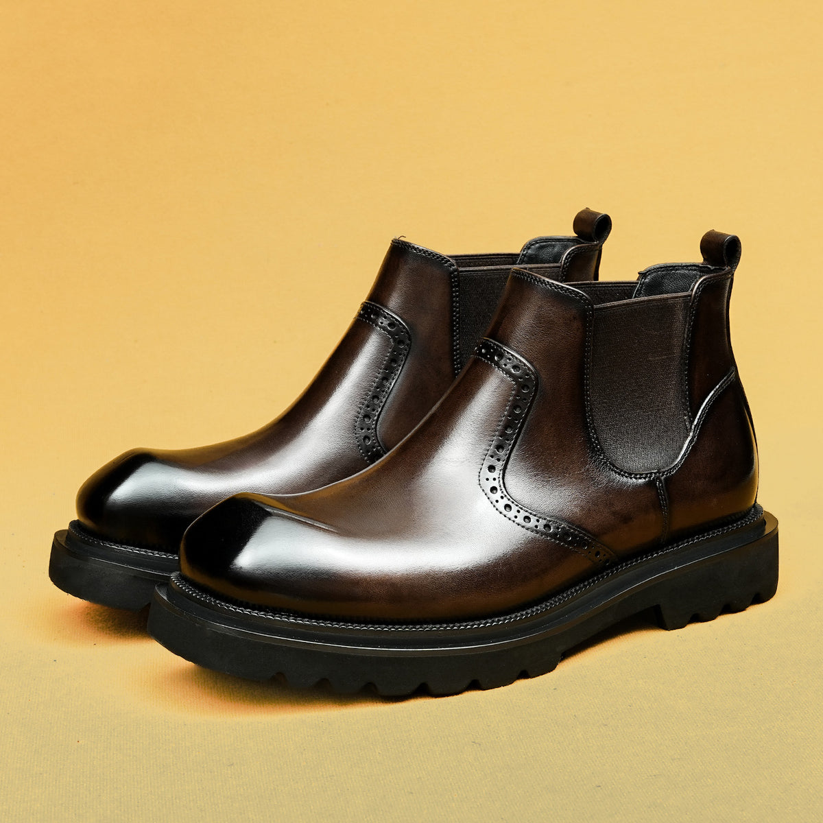 Men's dark brown leather chelsea dress boots with elastic side panels and lug sole