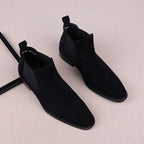 Black suede Chelsea dress boots with elastic side panels and pull tab
