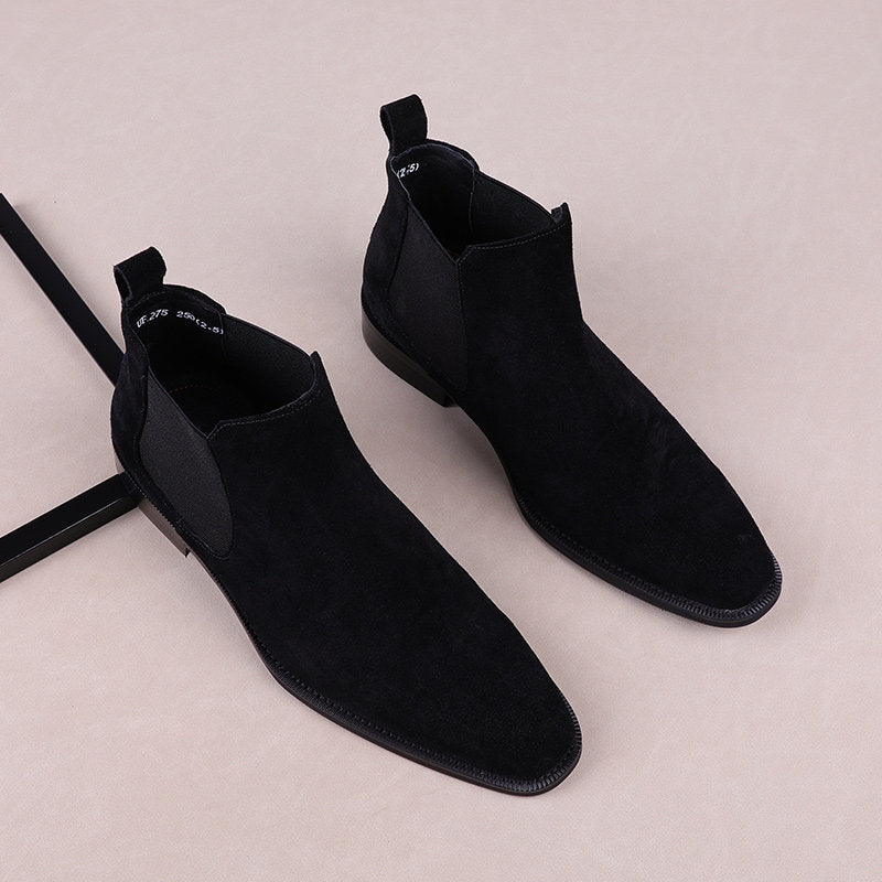 Black suede Chelsea dress boots with elastic side panels and pull tab